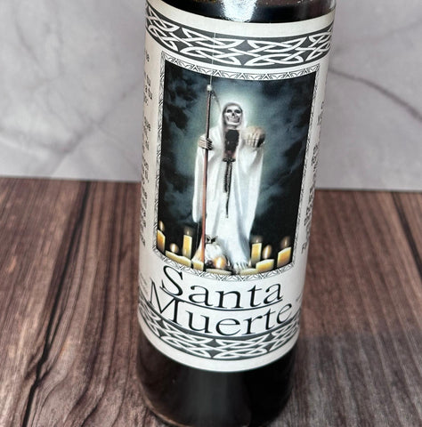 Plain black candle of Santa Muerte