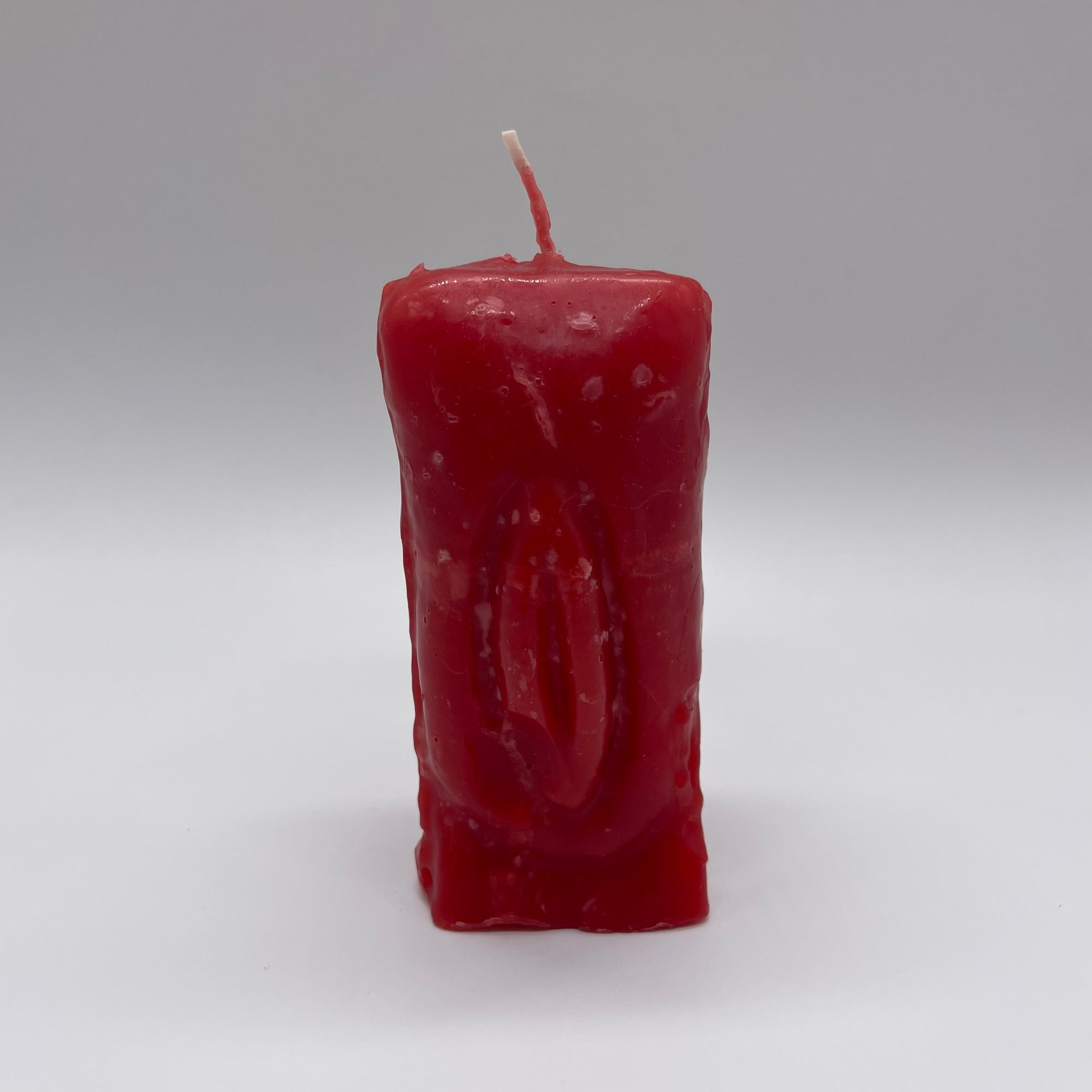 Female genital candle